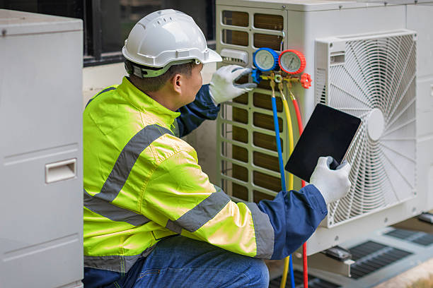 Professional Ac Installation technician working in Camanche, IA